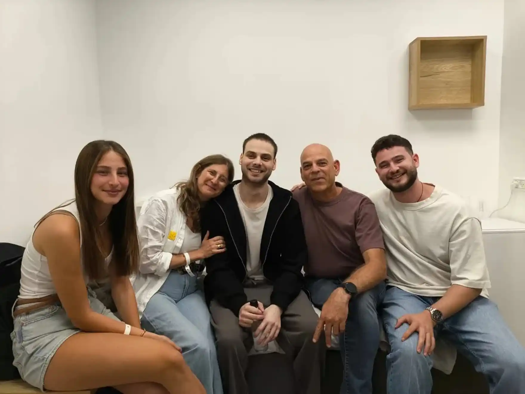 Eitan Mor is reunited with his family at Kibbutz Re’im as part of the hostage-prisoner swap and ceasefire deal agreed by Israel and Hamas