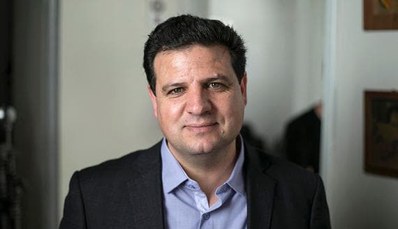 Head of the Joint Arab List poses before filming in Tel Aviv