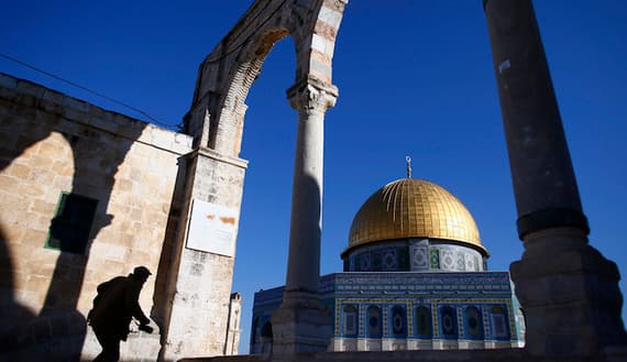 A man climbs the steps leading to the Dome of the Rock in Jerusalem’s Old City