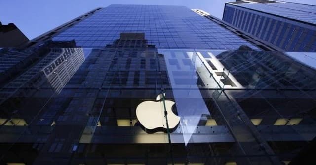 The Apple logo is lit on the first day of sale for the iPhone 6 and iPhone 6 Plus, in Sydney