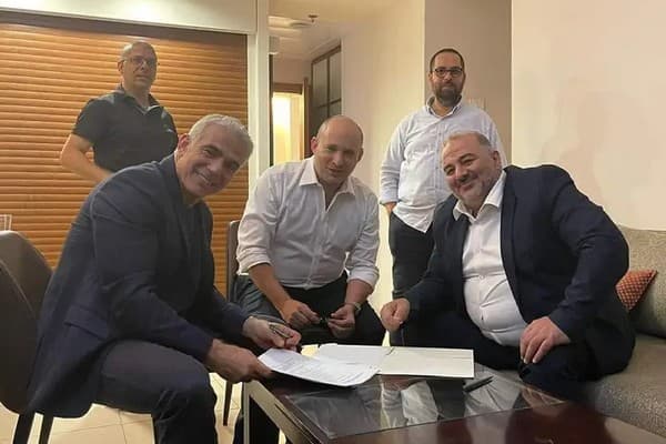 From left: Yair Lapid, Naftali Bennett and Mansour Abbas