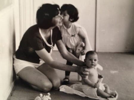 The author playing with her mother