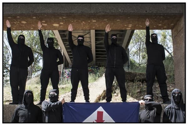 Members of the Nationalist Socialist Network captured in a retreat (SMH/Age)