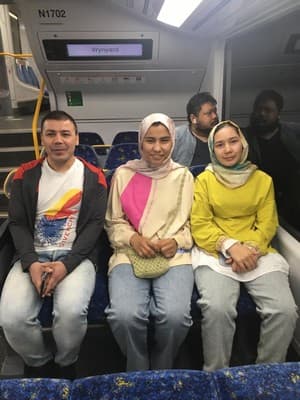 Members of the SASS Group 2 family on a train going to the Sydney Opera House