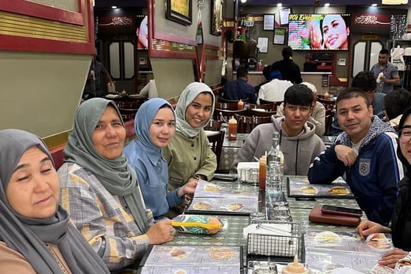 SASS Group 2 & 3 families at Kabul House restaurant. The families had never been to a restaurant before