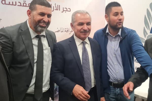 Palestinian PM Mohammad Shtayyeh (centre) visits the fair. To his right is Abdul-Rahman Yamak, director of Meral Stone and Marble Company (Courtesy of Abdul-Rahman Yamak)