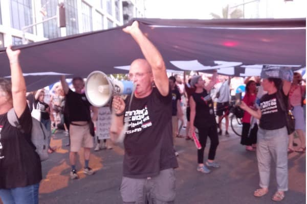 Doron Meinrath at a demonstration in Tel Aviv