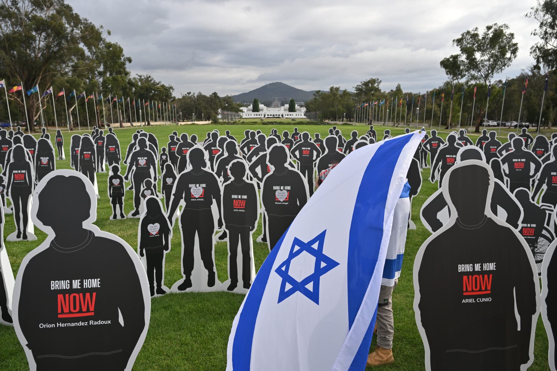 Cutout cardboard effigies outside Parliament House Canberra (AAP Image/Mick Tsikas).