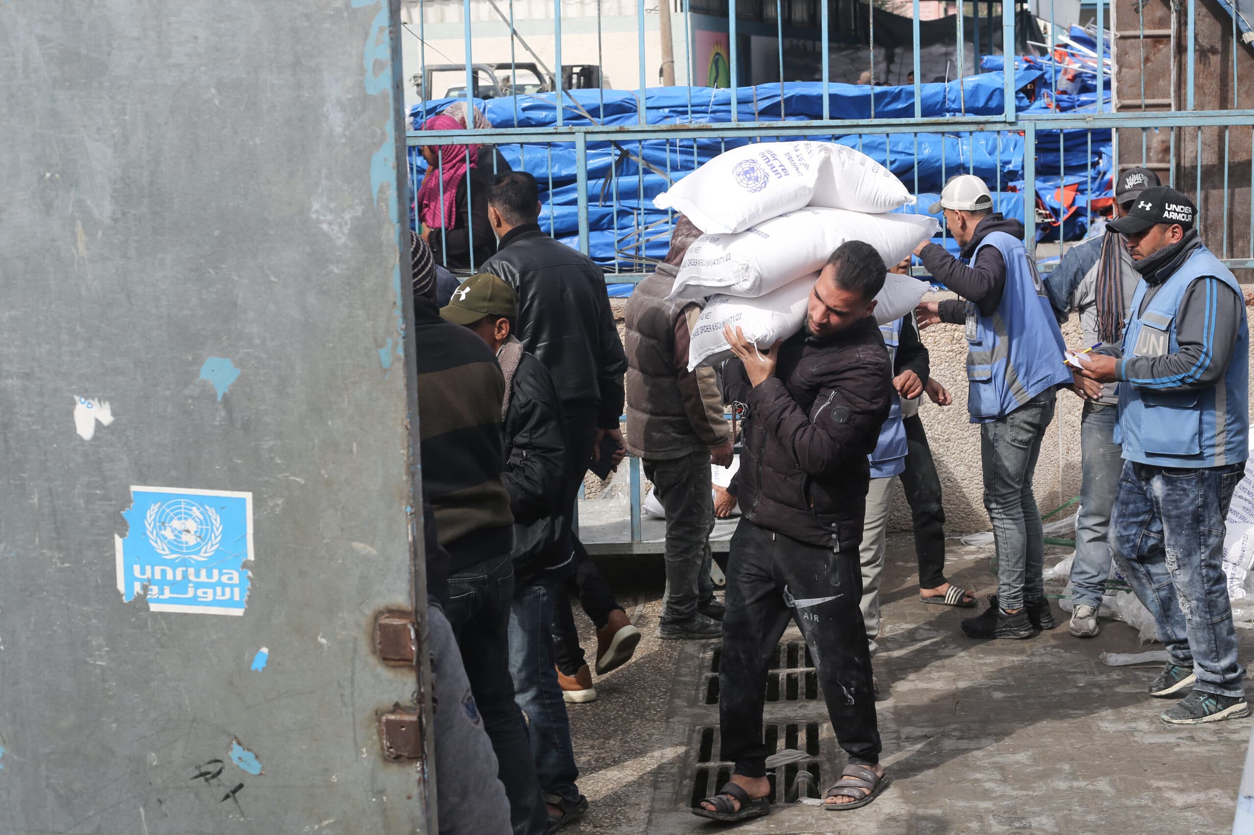 Man carrying sacks of flour