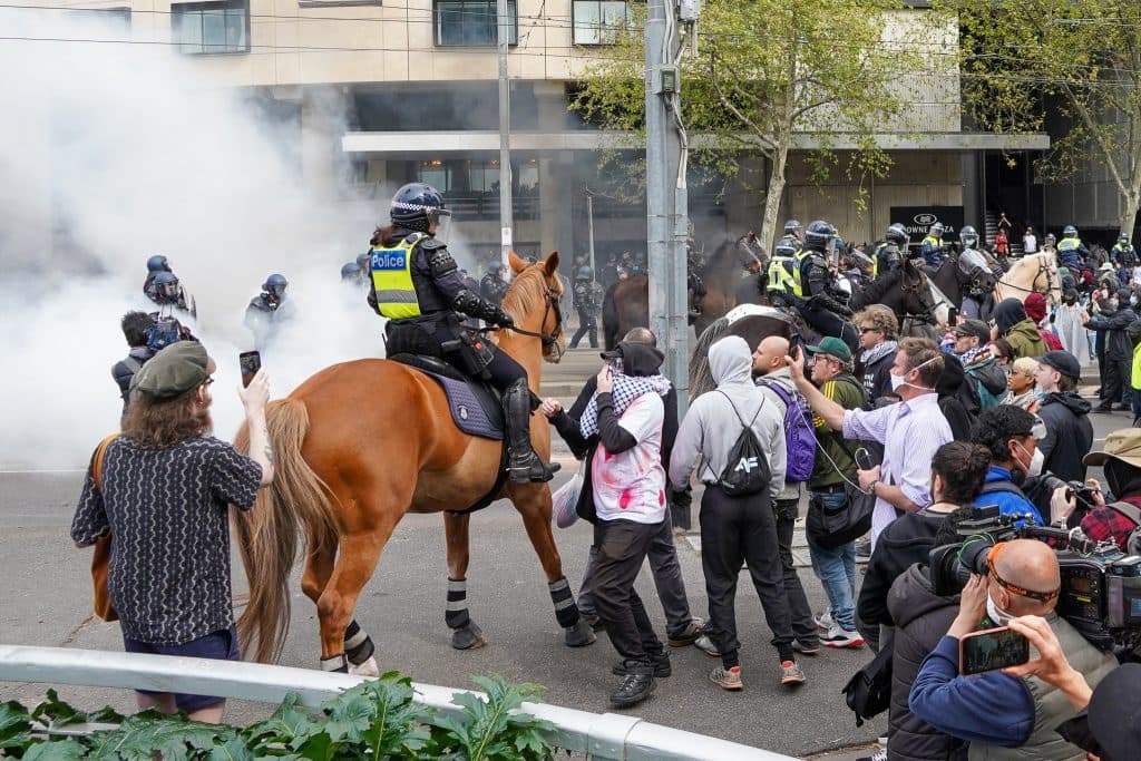 Mounted police attempting to control the crowd (Ben Bresley).