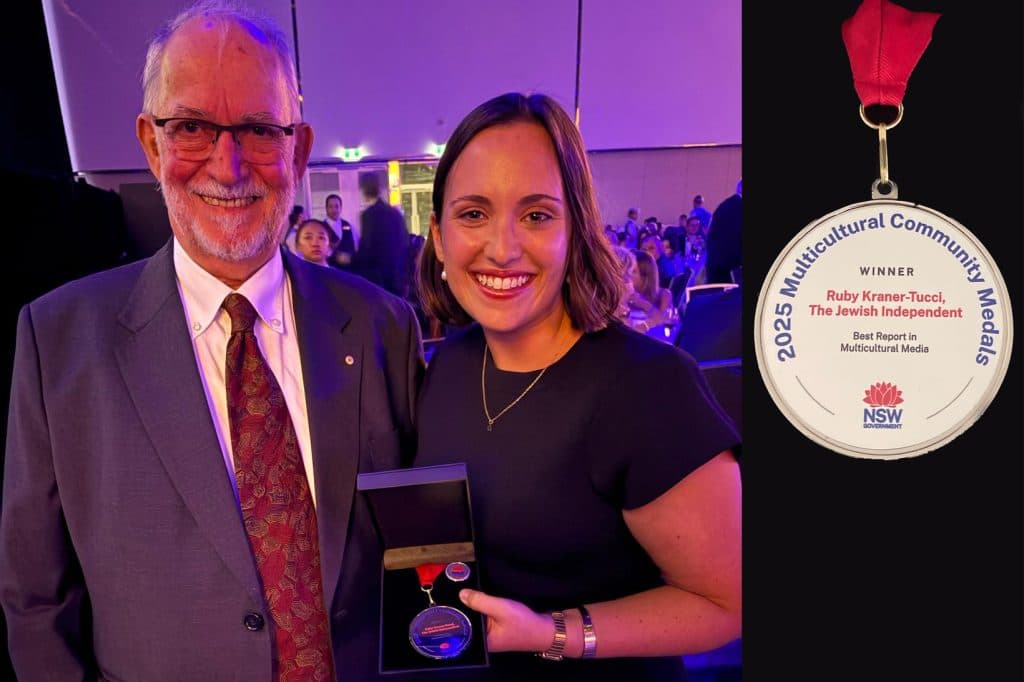 TJI Publisher Uri Windt and Assistant Editor Ruby Kraner-Tucci with the 2025 Best Report in Multicultural Media Medal (Image: TJI).