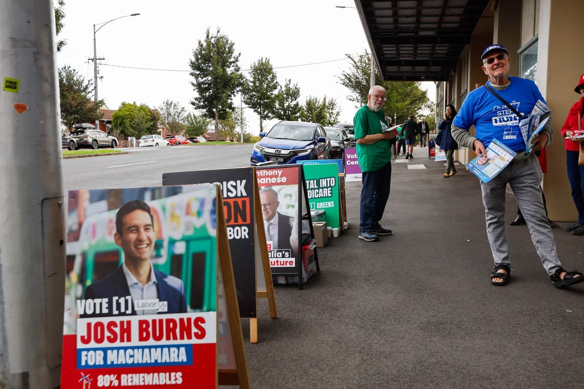 election corflutes for Josh Burns along the pavement