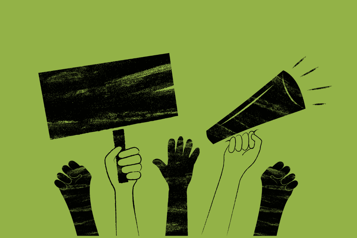 Hands raised with a placard and megaphone