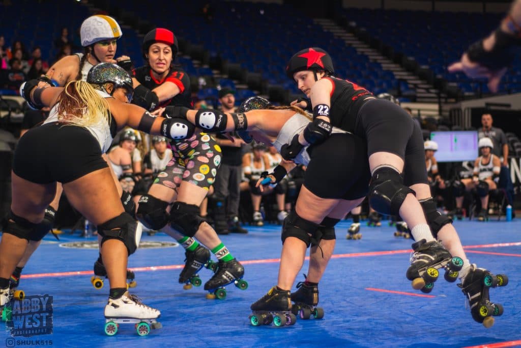 Alex Knopoff in the thick of the contact sport of roller derby (Abby West)