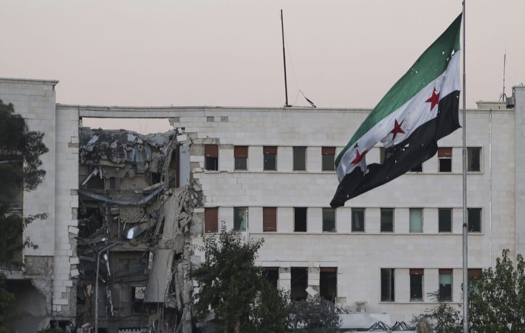 The Syrian Defense Ministry building sits heavily damaged after alleged Israeli airstrikes in Damascus, Syria, Wednesday, July 16, 2025 (Image: AP Photo/Ghaith Alsayed via AAP).