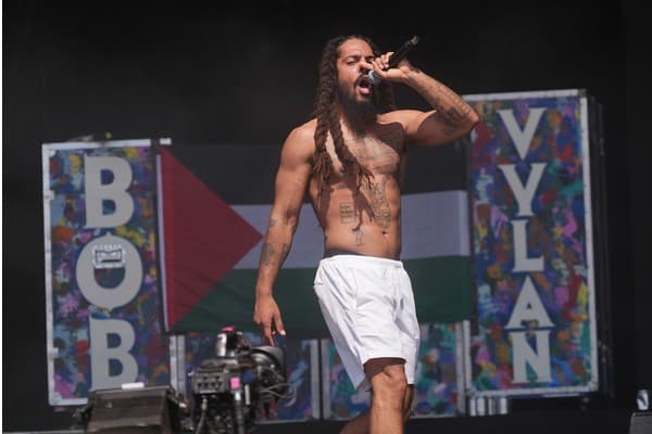 Pascal Robinson-Foster from Bob Vylan on stage at Glastonbury (Image: Yui Mok/PA)