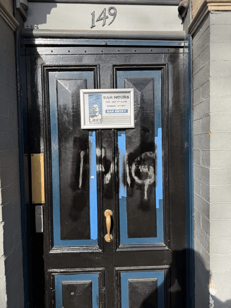 Homophobic graffiti sprayed across The Laird Hotel in Abbotsford (Image: supplied)