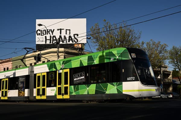 Billboard in Fitzroy, Melbourne, October 7, 2025 (AAP/Joel Carrett)