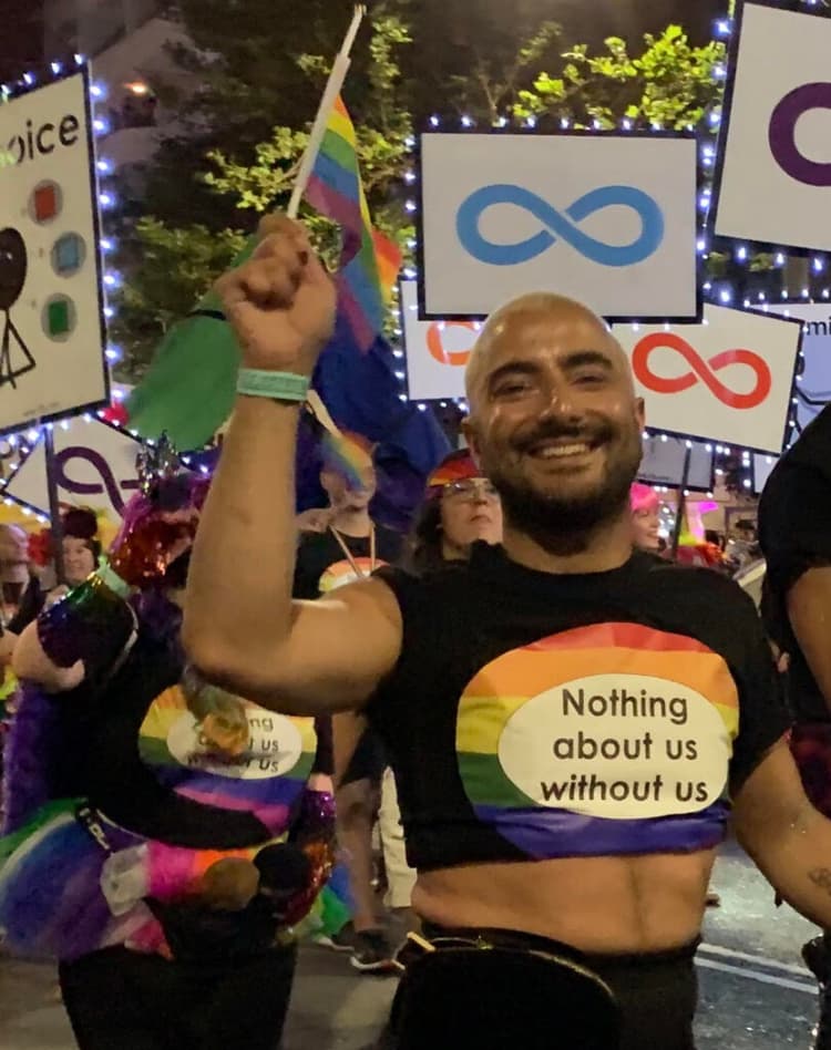 Deni in the Mardi Gras parade, prior to their conversion (image: supplied)