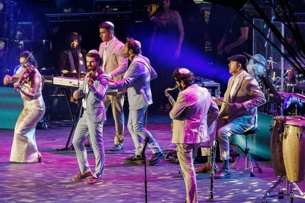 Ben Adler, second from left, leading SHIR