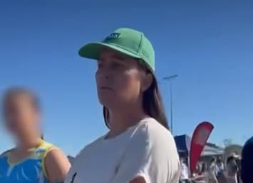woman charged netball slurs