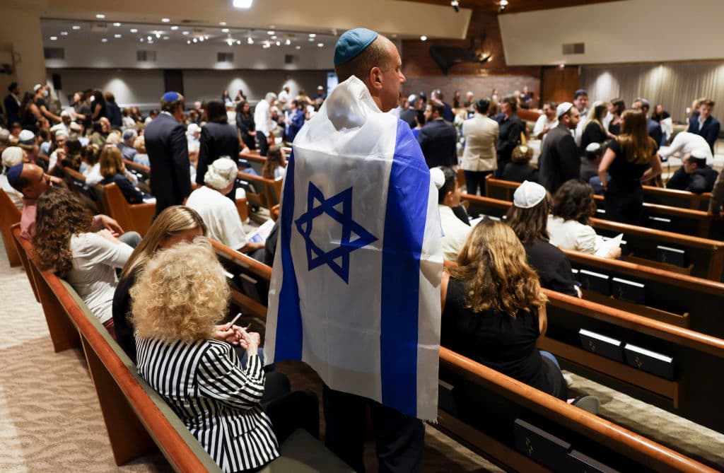 Israel flag synagogue vigil