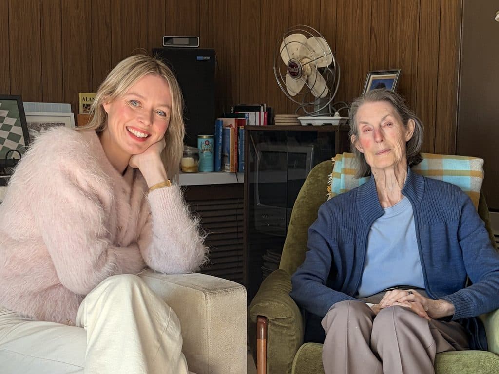 A CCare Aged Care visitor and the woman she visits (supplied)
