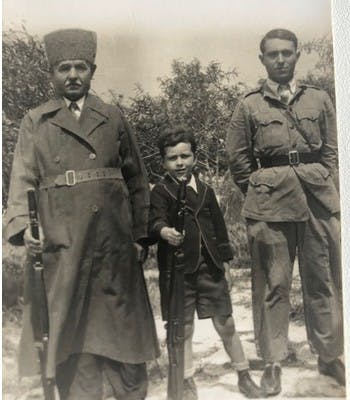 The author's grandfather in Palestine in about 1937 with his daughter Cecelia’s son and husband (supplied)