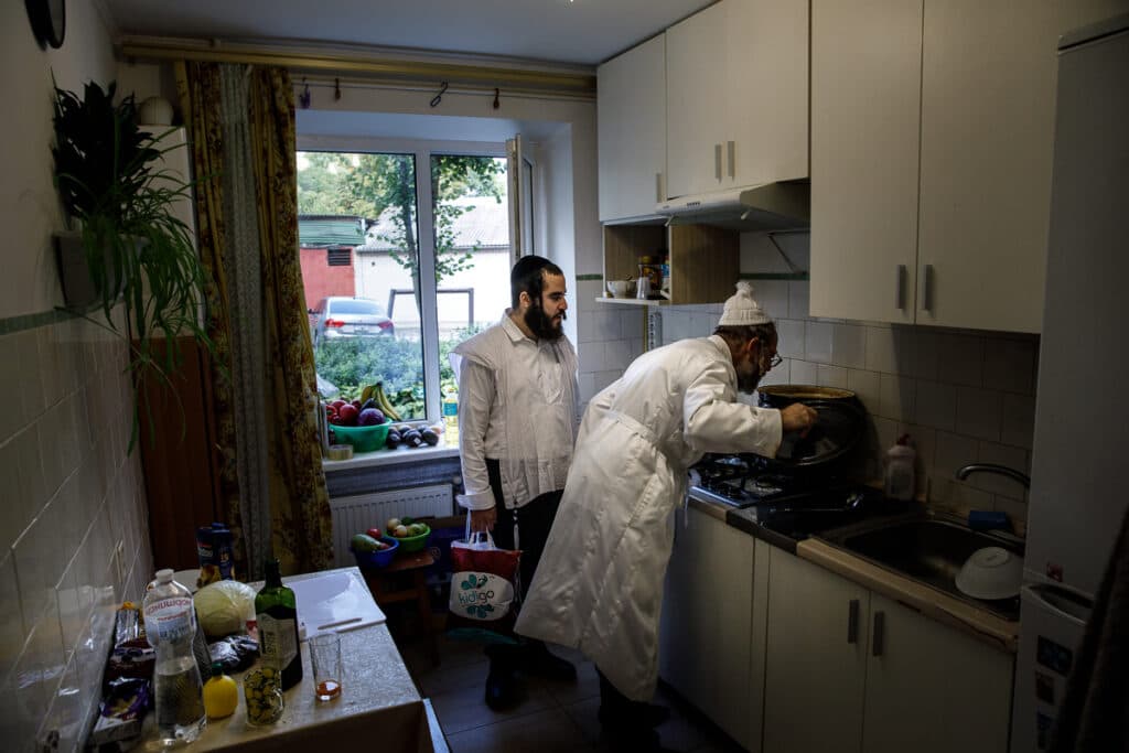 Hasdim kasher the kitchen of their rented apartment in Uman.