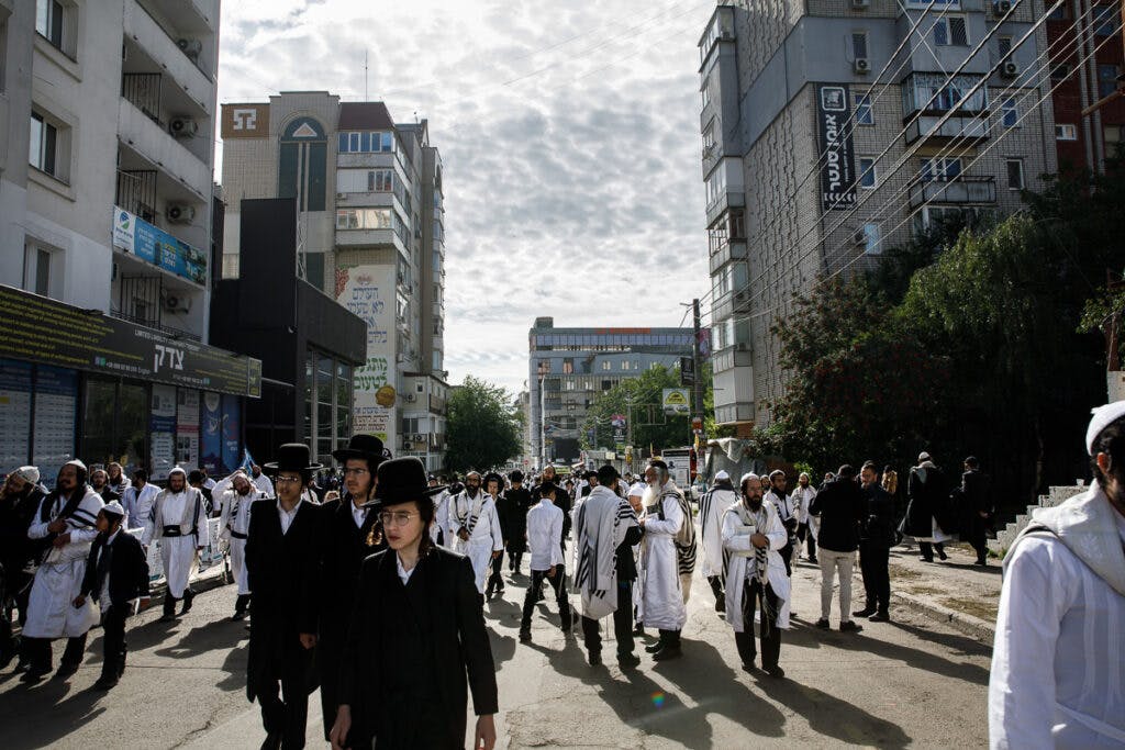 A crowd of pilgrims in the street in Uman