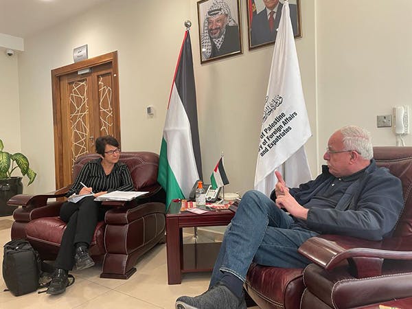 Deborah Stone interviews Minister Al-Maliki in Ramallah (Raed Mansour)