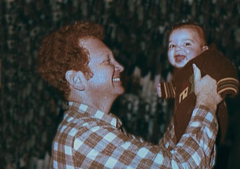 Reuven Flescher with his baby son Ittay in Ramat Gan in 1978