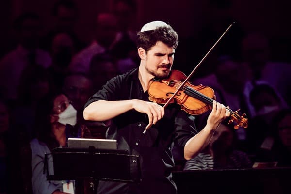 ACO violinist Ben Adler will play a much-travelled violin in the production
