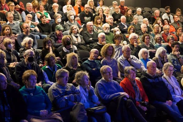 The crowd listens to Rami Elhanan and Bassam Aramin in Sydney. 