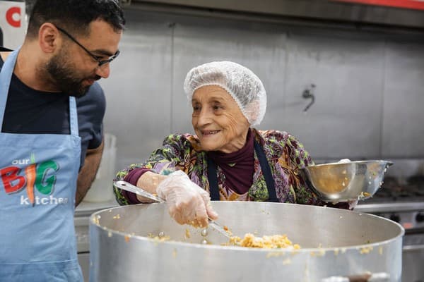 Volunteers Mustafa Alhassany and Carmen Oritz