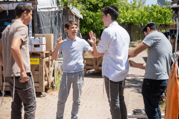 Jakey Parry, centre, on the set of 'Live to Give' (Torah Live)