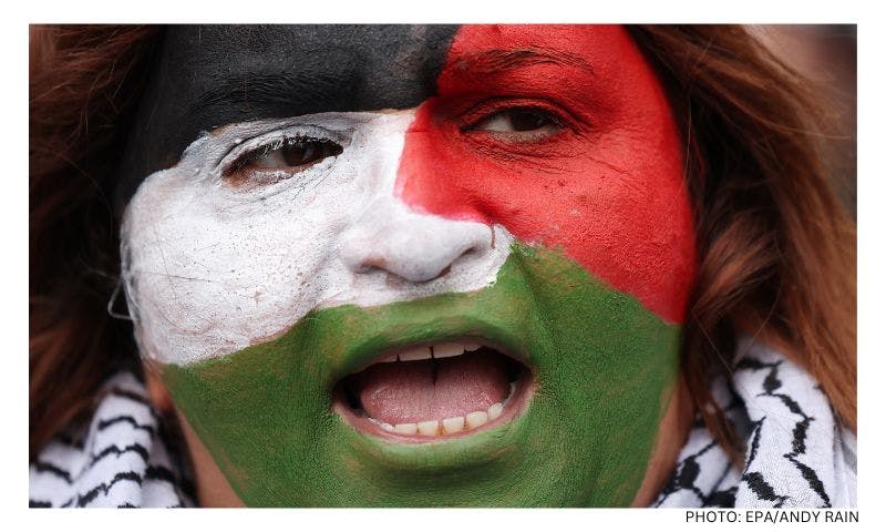 A sea of red, green, black and white across world cities