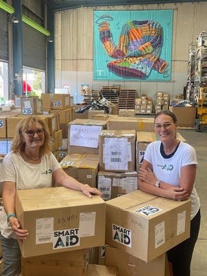 Alethea Gold and Jackie Vidor packing goods for Israel in Sydney.