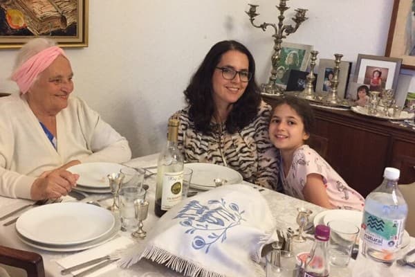 Mira at the Shabbat table