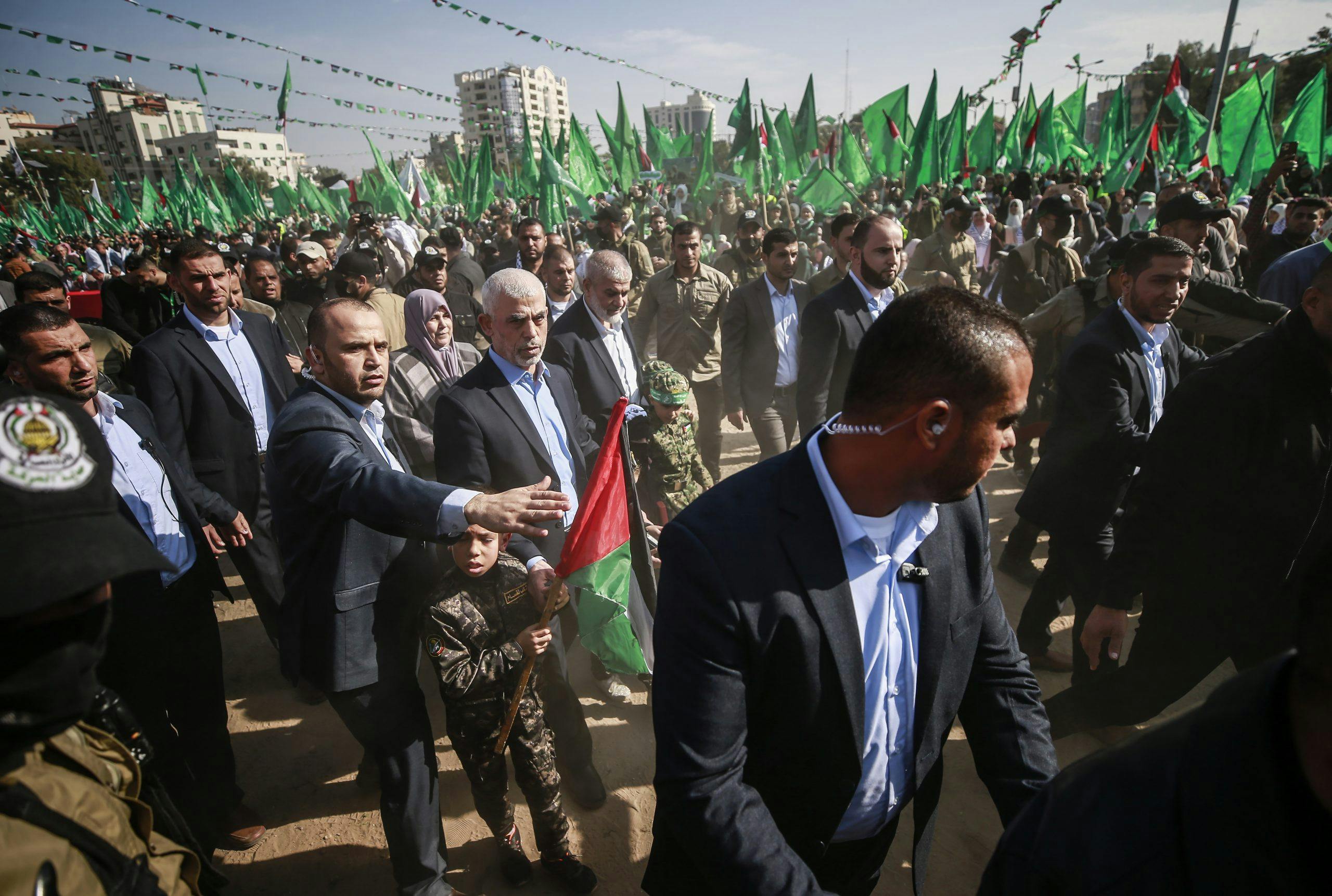 Hamas leader Yahya Al Sinwar (centre) attends a rally to mark the 35th anniversary of Hamas in Gaza City