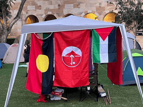 A flag supporting the Popular Front for the Liberation of Palestine, a designated terrorist organisation, was hung at UQ's pro-Palestinian encampment (Image: supplied).