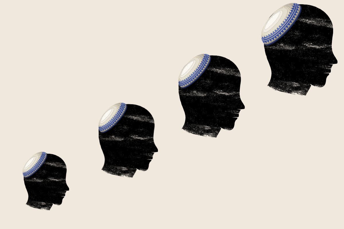 Four heads with skullcaps progressiving from small to large diagonally