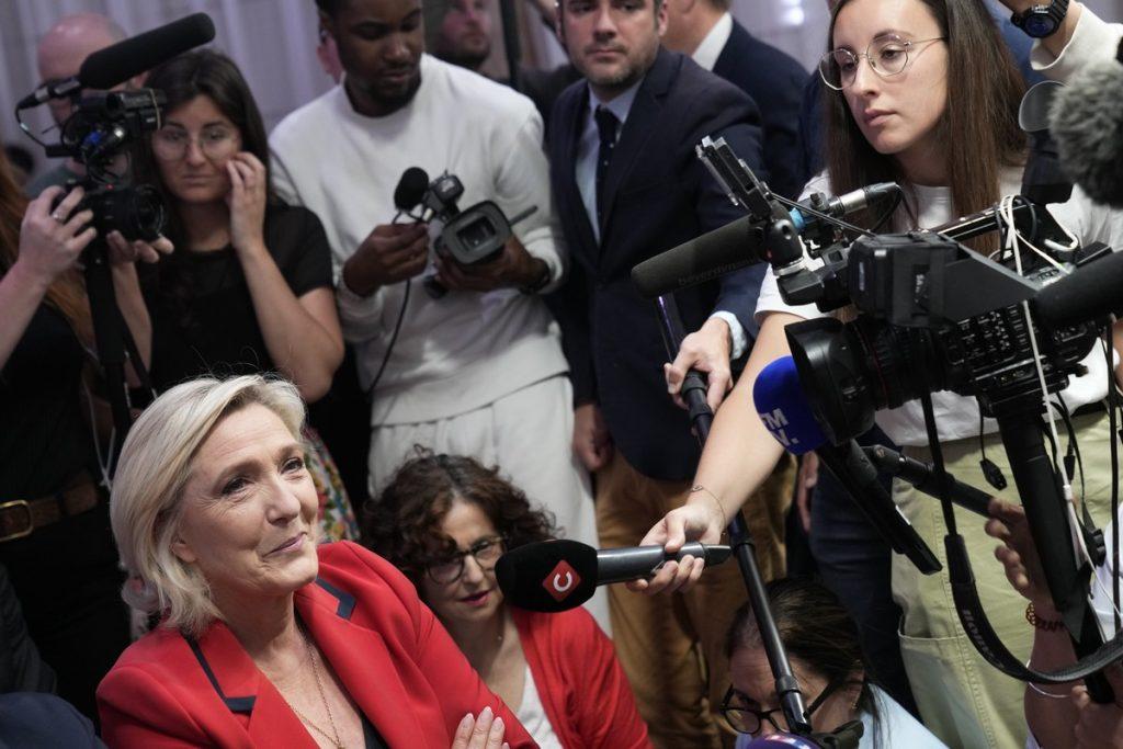 French far-right leader Marine Le Pen, left, attends a press conference June 24 (AP/Christophe Ena)