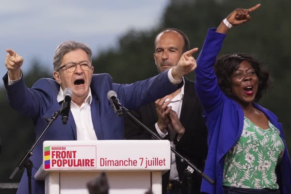 Far-left leader Jean-Luc Mélenchon (left) after the election results (EPA/Andre Pain)