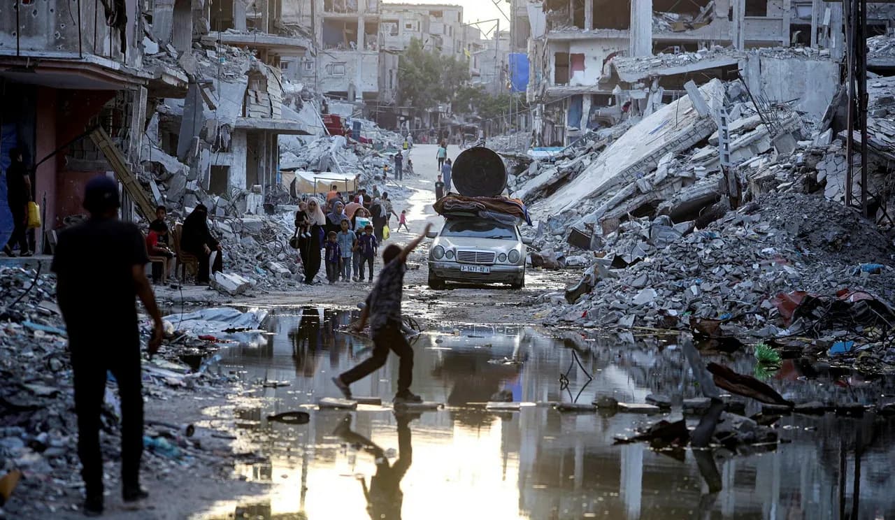 People walk past sewage in a messy urban setting