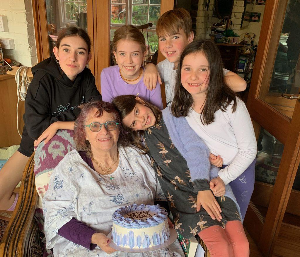 Helen celebrating her birthday with her "grandchildren" (Image: supplied).