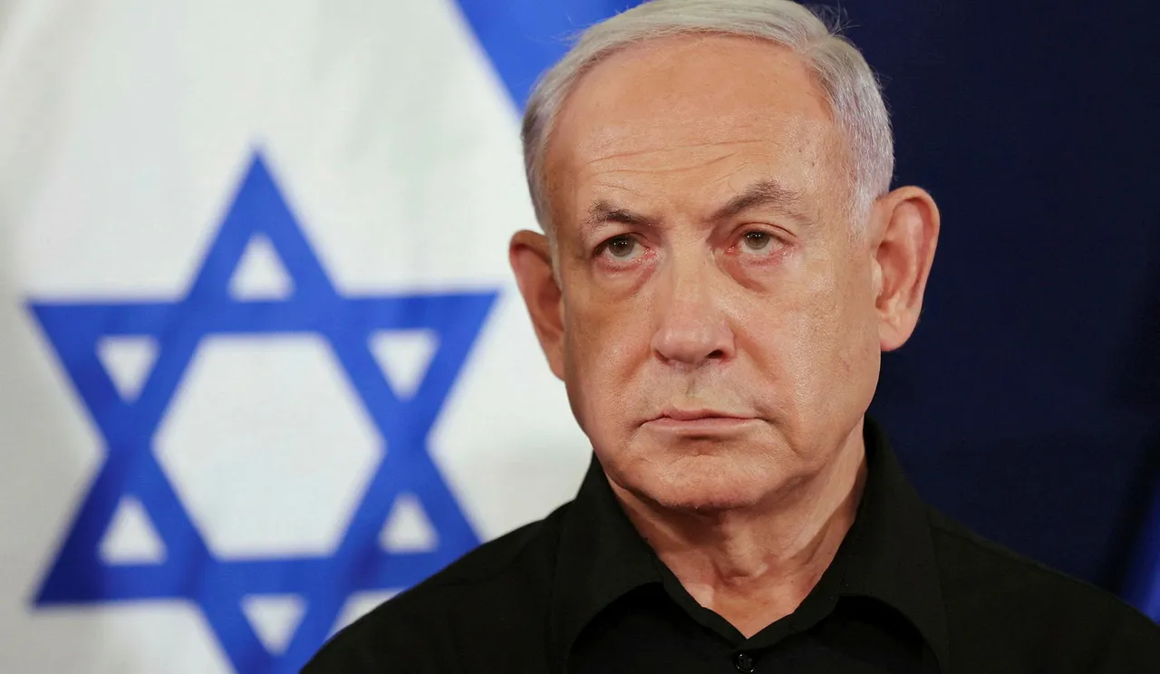 Man in front of Israeli flag