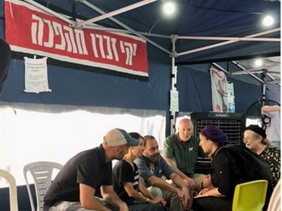 Hersh Goldberg-Polin's parents with well-wishers (Image: Facebook).