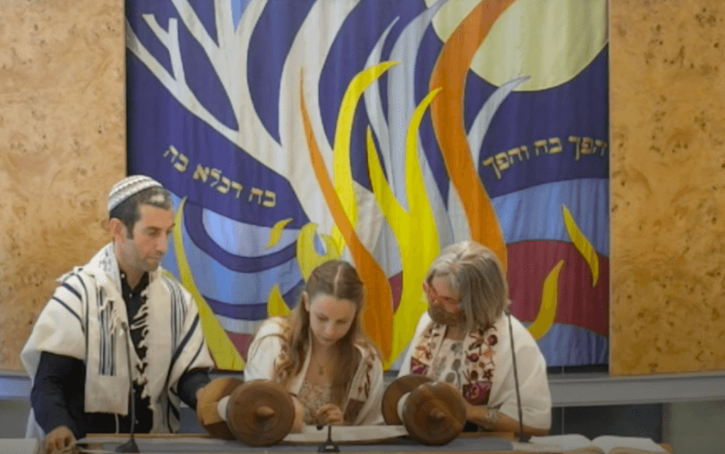 Noa with her parents Jono and Janet Granek preparing for her batmitzvah in Sydney