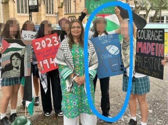 Greens Senator, Mehreen Faruqi, poses with an antisemitic poster.